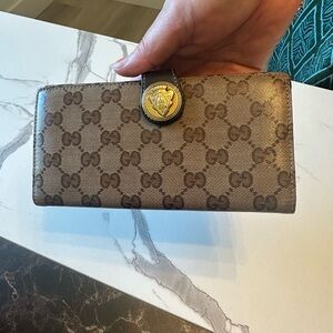 Authentic Brown Patterned Gucci crystal hysteria wallet.